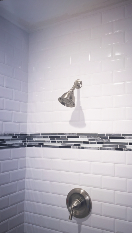 Decorative Pencil Tiles Used in Shower by Old South Flooring & Tile. Savannah, GA.