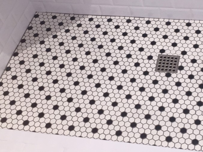 Hexagonal penny tiles laid in a 